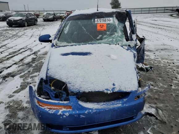 2007 Chevrolet Aveo LS z VIN KL1TD66637B752040, wystawiony jako Copart lot #87016614 z przebiegiem Nie podano mil oraz Szkoda całkowita • Salvage title. Historia ofert i sprzedaży dostępna na DreamBid. Obrazek 5.