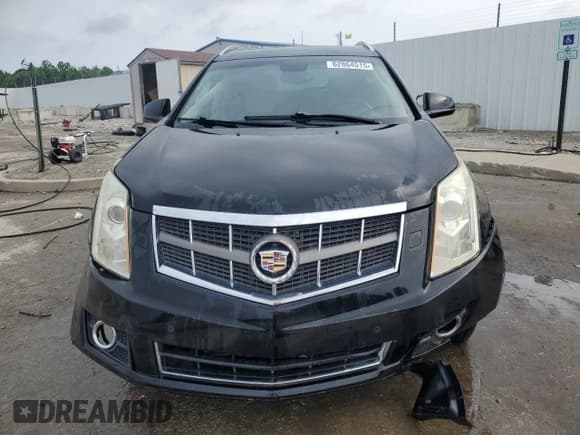 ✅ 2012 Cadillac SRX Premium Collection • VIN: 3GYFNCE34CS641854 • Lot: 62864515. Wystawiony na Copart z przebiegiem 155 534 mil. Bezpłatny archiwum sprzedaży aukcyjnych z USA i szczegółowy raport historii pojazdu na DreamBid. Zdjęcie 5.