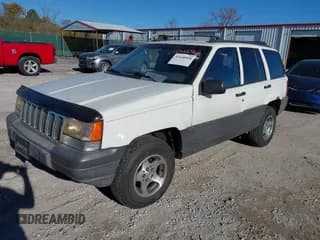 ✅ 1996 Jeep Grand Cherokee Laredo • VIN: 1J4GZ58Y9TC354849 • Лот: 43640968. Опубликован ранее на IAAI с пробегом 187 001 миль. Бесплатный доступ к архиву аукционных продаж из США и подробный отчёт об истории автомобиля на DreamBid. Изображение 2.