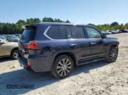 ✅ 2021 Lexus LX 570 • VIN: JTJDY7AXXM4339035 • Лот: 80049365. Опубликован ранее на Copart с пробегом 61 121 миль. Бесплатный доступ к архиву аукционных продаж из США и подробный отчёт об истории автомобиля на DreamBid. Изображение 3.