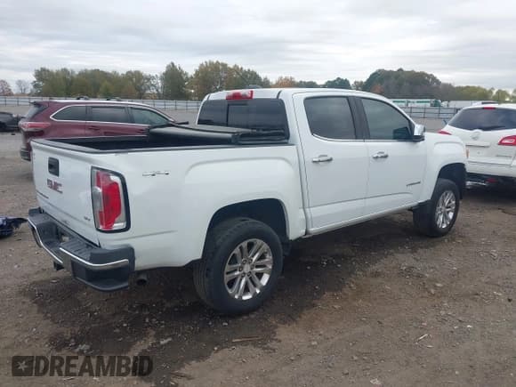 ✅ 2017 GMC Canyon 4WD SLT • VIN: 1GTG6DEN6H1249790 • Лот: 43609704. Опубликован ранее на IAAI с пробегом 141 693 миль. Бесплатный доступ к архиву аукционных продаж из США и подробный отчёт об истории автомобиля на DreamBid. Изображение 4.