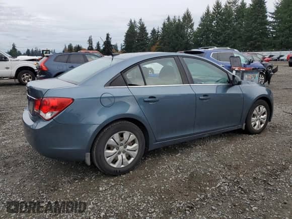 2012 Chevrolet Cruze LS z VIN 1G1PC5SH1C7250759, wystawiony jako Copart lot #89695005 z przebiegiem 207 599 mil mil oraz Szkoda całkowita • Salvage title. Historia ofert i sprzedaży dostępna na DreamBid. Obrazek 3.