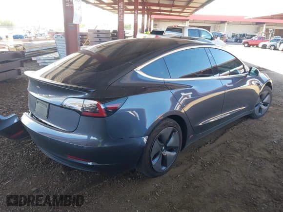✅ 2019 Tesla Model 3 Mid Range • VIN: 5YJ3E1EA8KF317194 • Lot: 43092433. Listed on IAAI with 127,954 mi. Free auction sales archive from the USA and detailed vehicle history report at DreamBid. Image 4.