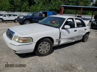 ✅ 2006 Mercury Grand Marquis GS • VIN: 2MEFM74V76X653558 • Лот: 70895815. Опубликован ранее на Copart с пробегом Не указан. Бесплатный доступ к архиву аукционных продаж из США и подробный отчёт об истории автомобиля на DreamBid. Изображение 1.