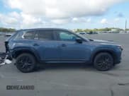 ✅ 2025 Mazda CX-50 S Preferred • VIN: 7MMVABBM1SN392085 • Lot: 43723950. Listed on IAAI with 1,452 mi. Free auction sales archive from the USA and detailed vehicle history report at DreamBid. Image 14.