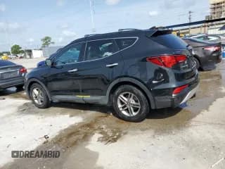 ✅ 2017 Hyundai Santa Fe 2.4L • VIN: 5NMZU3LBXHH016664 • Лот: 64079324. Опубликован ранее на Copart с пробегом 99 050 миль. Бесплатный доступ к архиву аукционных продаж из США и подробный отчёт об истории автомобиля на DreamBid. Изображение 2.