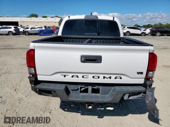 ✅ 2019 Toyota Tacoma SR • VIN: 3TMCZ5AN4KM281939 • Lot: 82433655. Listed on Copart with 93,721 mi. Free auction sales archive from the USA and detailed vehicle history report at DreamBid. Image 6.