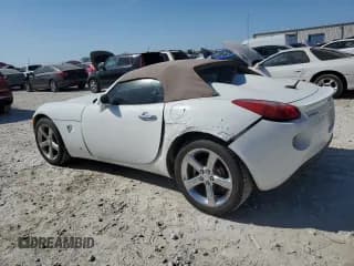 ✅ 2008 Pontiac Solstice • VIN: 1G2MB35B68Y124766 • Lot: 77439474. Wystawiony na Copart z przebiegiem 124 744 mil. Bezpłatny archiwum sprzedaży aukcyjnych z USA i szczegółowy raport historii pojazdu na DreamBid. Zdjęcie 2.