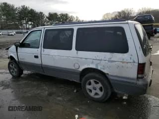 ✅ 1995 Dodge Caravan Grand SE • VIN: 1B4GH4431SX576058 • Lot: 87868445. Listed on Copart with 195,947 mi. Free auction sales archive from the USA and detailed vehicle history report at DreamBid. Image 2.