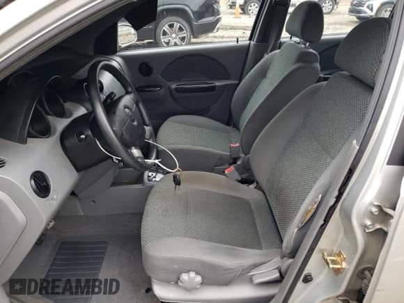 2005 Chevrolet Aveo LT z VIN KL1TG62615B413576, wystawiony jako Copart lot #67797175 z przebiegiem 90 290 mil mil oraz Szkoda całkowita • Salvage title. Historia ofert i sprzedaży dostępna na DreamBid. Obrazek 7.