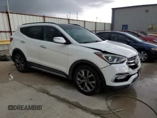 ✅ 2018 Hyundai Santa Fe Ultimate • VIN: 5NMZW4LA7JH092842 • Лот: 56568514. Опубликован ранее на Copart с пробегом 105 888 миль. Бесплатный доступ к архиву аукционных продаж из США и подробный отчёт об истории автомобиля на DreamBid. Изображение 4.
