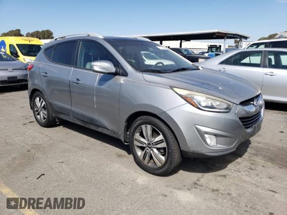 2015 Hyundai Tucson SE z VIN KM8JU3AG7FU098981, wystawiony jako Copart lot #71804224 z przebiegiem 179 496 mil mil oraz Czysty tytuł • Clean title. Historia ofert i sprzedaży dostępna na DreamBid. Obrazek 4.