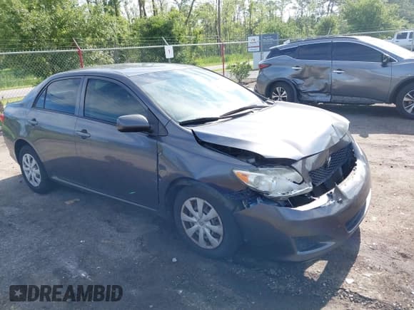 ✅ 2010 Toyota Corolla • VIN: JTDBU4EE0AJ075558 • Lot: 42333233. Listed on IAAI with 98,969 mi. Free auction sales archive from the USA and detailed vehicle history report at DreamBid. Image 1.