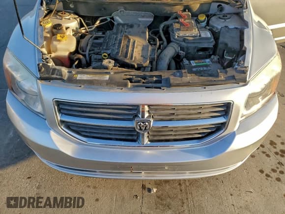 ✅ 2012 Dodge Caliber SXT • VIN: 1C3CDWDA9CD535837 • Лот: 92117905. Опубликован ранее на Copart с пробегом 150 512 миль. Бесплатный доступ к архиву аукционных продаж из США и подробный отчёт об истории автомобиля на DreamBid. Изображение 11.