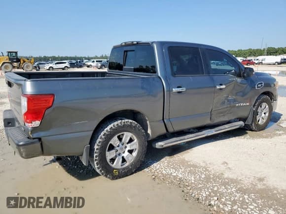 ✅ 2017 Nissan Titan SV • VIN: 1N6AA1E65HN534997 • Лот: 71353865. Опубликован ранее на Copart с пробегом 164 532 миль. Бесплатный доступ к архиву аукционных продаж из США и подробный отчёт об истории автомобиля на DreamBid. Изображение 3.