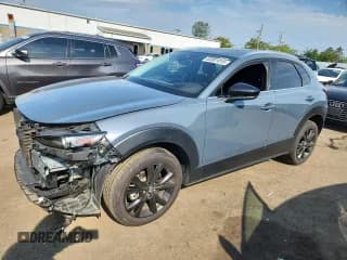 ✅ 2021 Mazda CX-30 Premium • VIN: 3MVDMBDY9MM308867 • Lot: 65981015. Listed on Copart with 38,222 mi. Free auction sales archive from the USA and detailed vehicle history report at DreamBid. Image 1.