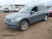 ✅ 2020 Volkswagen Tiguan S • VIN: 3VV0B7AX8LM146955 • Lot: 41723537. Listed on IAAI with 55,816 mi. Free auction sales archive from the USA and detailed vehicle history report at DreamBid. Image 2.
