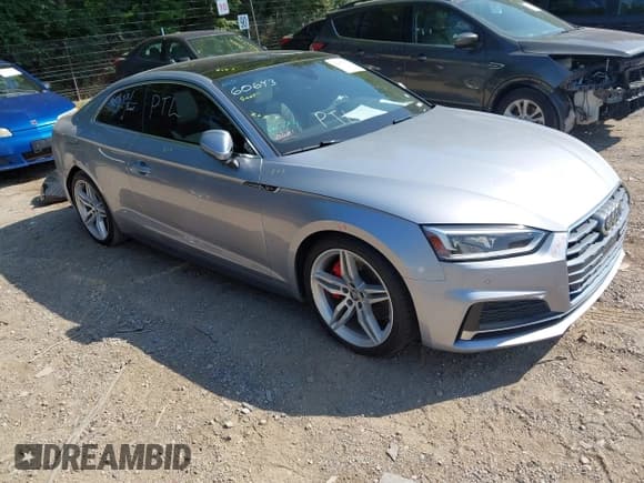 ✅ 2018 Audi A5 Premium Plus • VIN: WAUTNAF51JA010858 • Lot: 42647257. Listed on IAAI with 68,000 mi. Free auction sales archive from the USA and detailed vehicle history report at DreamBid. Image 1.