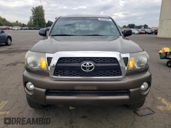 ✅ 2011 Toyota Tacoma • VIN: 3TMLU4EN1BM057479 • Lot: 85938495. Listed on Copart with 86,574 mi. Free auction sales archive from the USA and detailed vehicle history report at DreamBid. Image 5.