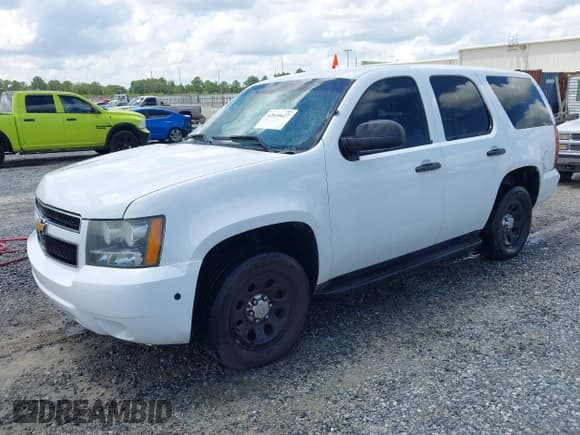 ✅ 2013 Chevrolet Tahoe Commercial • VIN: 1GNLC2E05DR327981 • Lot: 42835627. Wystawiony na IAAI z przebiegiem 164 099 mil. Bezpłatny archiwum sprzedaży aukcyjnych z USA i szczegółowy raport historii pojazdu na DreamBid. Zdjęcie 2.