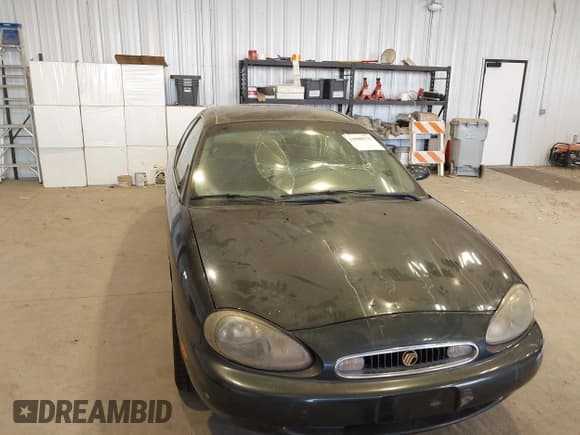 ✅ 1998 Mercury Sable GS • VIN: 1MEFM50U2WA614242 • Lot: 43900170. Listed on IAAI with 76,790 mi. Free auction sales archive from the USA and detailed vehicle history report at DreamBid. Image 6.