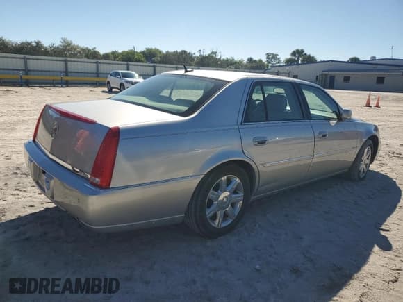 ✅ 2007 Cadillac DTS Luxury I • VIN: 1G6KD57YX7U144165 • Лот: 90364975. Опубликован ранее на Copart с пробегом 74 497 миль. Бесплатный доступ к архиву аукционных продаж из США и подробный отчёт об истории автомобиля на DreamBid. Изображение 3.