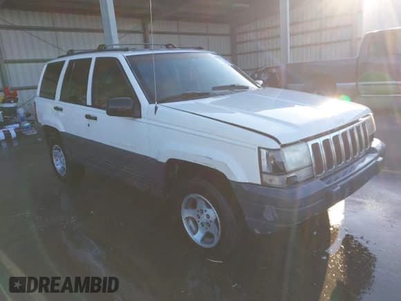 ✅ 1996 Jeep Grand Cherokee Laredo • VIN: 1J4FX58SXTC298997 • Lot: 43678167. Wystawiony na IAAI z przebiegiem 182 475 mil. Bezpłatny archiwum sprzedaży aukcyjnych z USA i szczegółowy raport historii pojazdu na DreamBid. Zdjęcie 1.