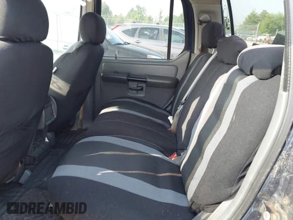 ✅ 2005 Ford Explorer Sport Trac XLS • VIN: 1FMZU77K25UB81061 • Лот: 42834880. Опубликован ранее на IAAI с пробегом 247 470 миль. Бесплатный доступ к архиву аукционных продаж из США и подробный отчёт об истории автомобиля на DreamBid. Изображение 8.