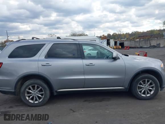 2017 Dodge Durango SXT z VIN 1C4RDJAG9HC651229, wystawiony jako IAAI lot #43573140 z przebiegiem 166 531 mil mil oraz . Historia ofert i sprzedaży dostępna na DreamBid. Obrazek 13.