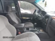 ✅ 1999 Jeep Grand Cherokee Laredo • VIN: 1J4G258SXXC518647 • Лот: 42124724. Опубликован ранее на IAAI с пробегом 229 668 миль. Бесплатный доступ к архиву аукционных продаж из США и подробный отчёт об истории автомобиля на DreamBid. Изображение 5.