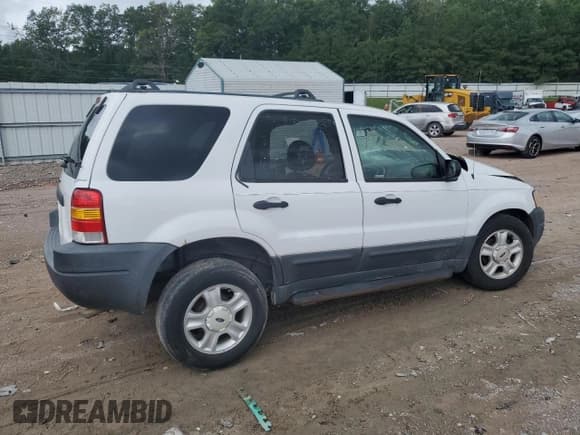 ✅ 2003 Ford Escape XLT Popular • VIN: 1FMYU03173KC63585 • Lot: 63828115. Listed on Copart with Not provided. Free auction sales archive from the USA and detailed vehicle history report at DreamBid. Image 3.