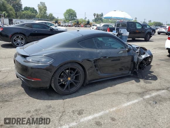 ✅ 2018 Porsche 718 Cayman • VIN: WP0AA2A80JK261670 • Lot: 60250575. Wystawiony na Copart z przebiegiem 73 522 mil. Bezpłatny archiwum sprzedaży aukcyjnych z USA i szczegółowy raport historii pojazdu na DreamBid. Zdjęcie 3.