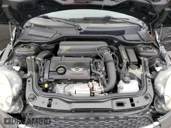 2012 MINI Hardtop S with VIN WMWSV3C52CTY17540, listed as a Copart auction lot 64137185 with 115,542 mi miles and Salvage title. Bid and sale history available at DreamBid. Image 11.