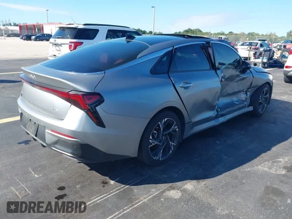 ✅ 2025 Kia K5 GT-Line • VIN: KNAG64J76S5279988 • Lot: 43438042. Wystawiony na IAAI z przebiegiem 14 668 mil. Bezpłatny archiwum sprzedaży aukcyjnych z USA i szczegółowy raport historii pojazdu na DreamBid. Zdjęcie 4.