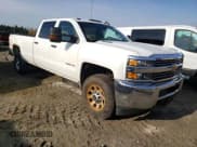 ✅ 2015 Chevrolet Silverado 2500HD Work Truck • VIN: 1GC1KUE89FF638855 • Lot: 77013604. Listed on Copart with 196,301 mi. Free auction sales archive from the USA and detailed vehicle history report at DreamBid. Image 4.