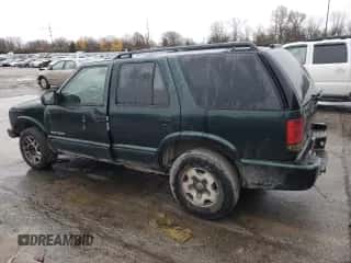 2002 Chevrolet Blazer LS z VIN 1GNDT13WX2K219285, wystawiony jako Copart lot #81238524 z przebiegiem 209 498 mil mil oraz Szkoda całkowita • Salvage title. Historia ofert i sprzedaży dostępna na DreamBid. Obrazek 2.