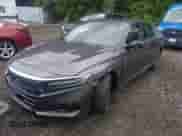 2022 Honda Accord EX-L с VIN 1HGCV1F56NA006721, выставлен на аукционе IAAI как лот 43030981 с пробегом 102 894 миль миль и . История ставок и продаж доступна на DreamBid. Изображение 2.