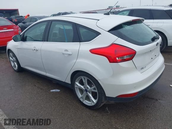 ✅ 2016 Ford Focus Titanium • VIN: 1FADP3N26GL387872 • Lot: 42183397. Listed on IAAI with 30,557 mi. Free auction sales archive from the USA and detailed vehicle history report at DreamBid. Image 3.