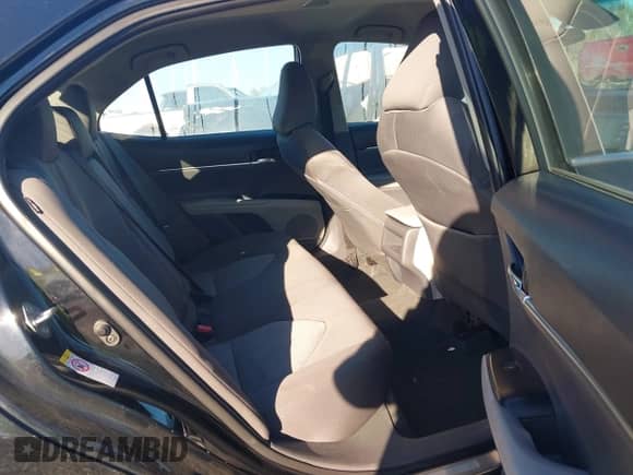 2019 Toyota Camry LE with VIN 4T1B11HK1KU697946, listed as a IAAI auction lot 43424429 with 289,881 mi miles and . Bid and sale history available at DreamBid. Image 8.