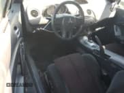 ✅ 2012 Mitsubishi Eclipse GS Sport • VIN: 4A37L2EF4CE003177 • Lot: 72350864. Wystawiony na Copart z przebiegiem 127 606 mil. Bezpłatny archiwum sprzedaży aukcyjnych z USA i szczegółowy raport historii pojazdu na DreamBid. Zdjęcie 8.