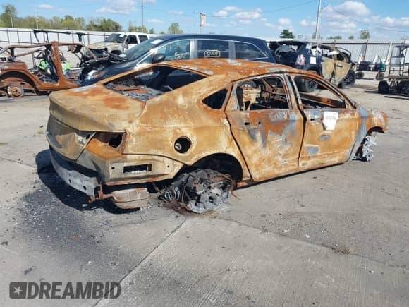 2015 Chevrolet Impala LTZ z VIN 2G1165S39F9112052, wystawiony jako IAAI lot #43323705 z przebiegiem Nie podano mil oraz . Historia ofert i sprzedaży dostępna na DreamBid. Obrazek 4.