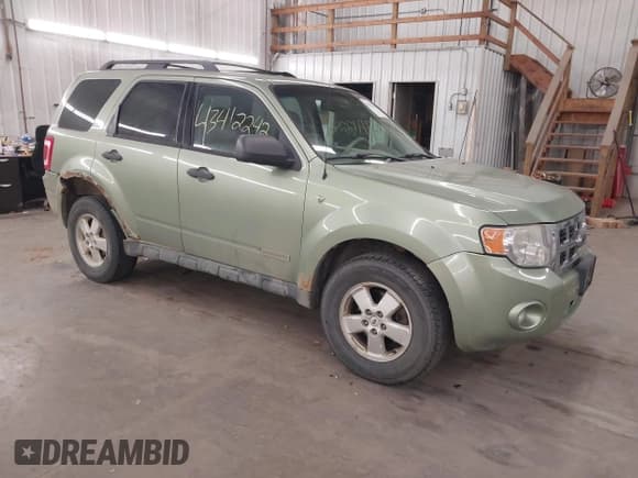 ✅ 2008 Ford Escape XLT • VIN: 1FMCU03148KB16125 • Lot: 43412242. Listed on IAAI with 241,799 mi. Free auction sales archive from the USA and detailed vehicle history report at DreamBid. Image 1.