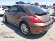 ✅ 2016 Volkswagen Beetle SE • VIN: 3VWJ07AT4GM634261 • Lot: 42043450. Listed on IAAI with 107,280 mi. Free auction sales archive from the USA and detailed vehicle history report at DreamBid. Image 3.