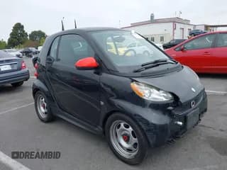 ✅ 2013 Smart fortwo Pure • VIN: WMEEJ3BA1DK651627 • Lot: 42733791. Wystawiony na IAAI z przebiegiem 130 561 mil. Bezpłatny archiwum sprzedaży aukcyjnych z USA i szczegółowy raport historii pojazdu na DreamBid. Zdjęcie 1.