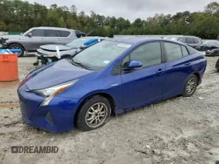 2018 Toyota Prius Two z VIN JTDKBRFU3J3595637, wystawiony jako Copart lot #90105975 z przebiegiem 257 844 mil mil oraz Czysty tytuł • Clean title. Historia ofert i sprzedaży dostępna na DreamBid. Obrazek 1.