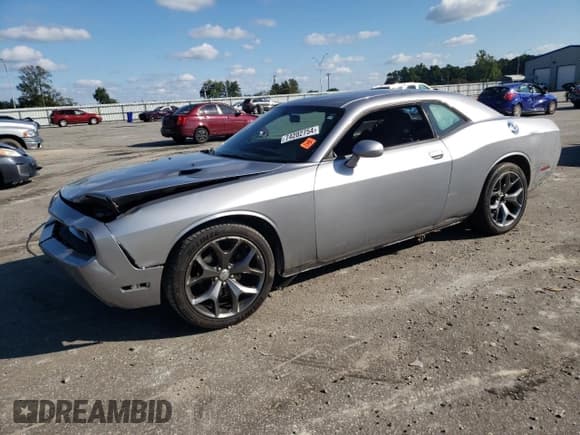 ✅ 2014 Dodge Challenger SXT • VIN: 2C3CDYAG0EH262085 • Lot: 74202754. Wystawiony na Copart z przebiegiem 148 222 mil. Bezpłatny archiwum sprzedaży aukcyjnych z USA i szczegółowy raport historii pojazdu na DreamBid. Zdjęcie 1.