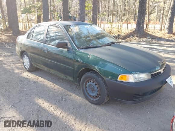 ✅ 2001 Mitsubishi Mirage ES • VIN: JA3AY26C01U042235 • Lot: 41899635. Listed on IAAI with 101,058 mi. Free auction sales archive from the USA and detailed vehicle history report at DreamBid. Image 1.