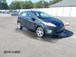 ✅ 2011 Ford Fiesta SES • VIN: 3FADP4FJ3BM106291 • Lot: 43273645. Wystawiony na IAAI z przebiegiem 146 606 mil. Bezpłatny archiwum sprzedaży aukcyjnych z USA i szczegółowy raport historii pojazdu na DreamBid. Zdjęcie 1.