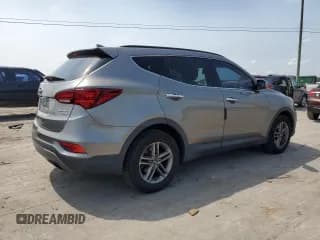 ✅ 2017 Hyundai Santa Fe 2.4L • VIN: 5XYZUDLB2HG384028 • Лот: 57948904. Опубликован ранее на Copart с пробегом 89 134 миль. Бесплатный доступ к архиву аукционных продаж из США и подробный отчёт об истории автомобиля на DreamBid. Изображение 3.