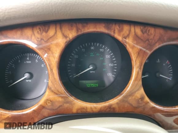 ✅ 1998 Jaguar XJ Vanden Plas • VIN: SAJKX6245WC830912 • Lot: 49717285. Wystawiony na Copart z przebiegiem 127 509 mil. Bezpłatny archiwum sprzedaży aukcyjnych z USA i szczegółowy raport historii pojazdu na DreamBid. Zdjęcie 9.